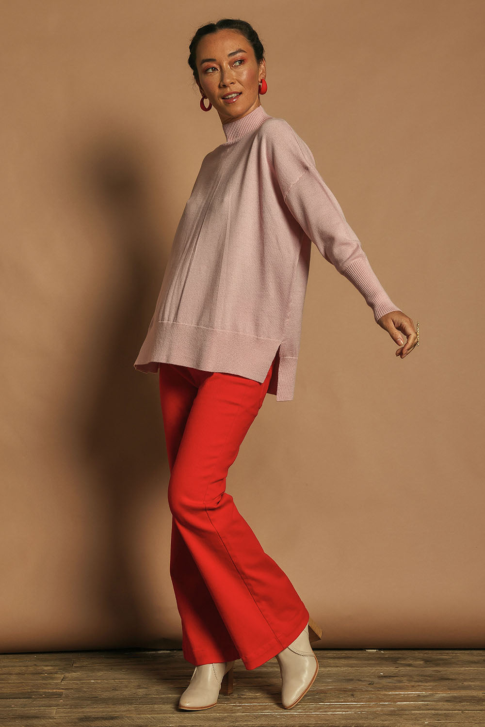 Model Katie wearing size 10 of the Denim Patch Pocket Jean in colour Red (Red), from the front, showing the whole outfit