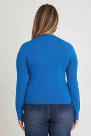 Model Chanel wearing size XL of the Extra Fine Merino Wool Long Sleeve Knit in colour Blue (Blue), from the back