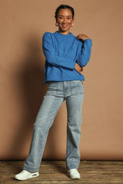 Model Katie wearing size S of the Diamond Crew Neck Sweater in colour Cobalt (Blue), from the front, showing the whole outfit