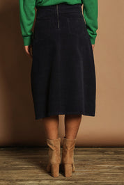Model Katie wearing size 10 of the Cotton Corduroy A Line Skirt in colour Deepblue (Blue), from the back