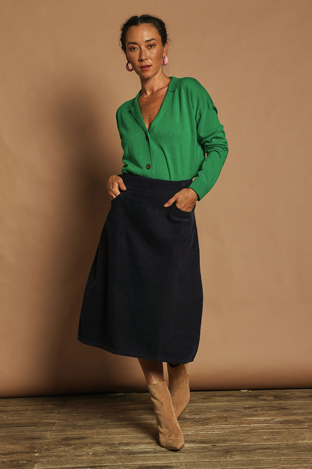 Model Katie wearing size 10 of the Cotton Corduroy A Line Skirt in colour Deepblue (Blue), from the front, showing the whole outfit