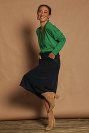 Model Katie wearing size 10 of the Cotton Corduroy A Line Skirt in colour Deepblue (Blue), from the front, showing the whole outfit