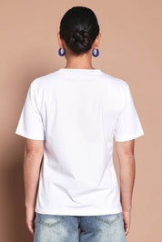 Model Katie wearing size 10 of the Mercerized Cotton Love Tee in colour Boldblue (Blue), from the back