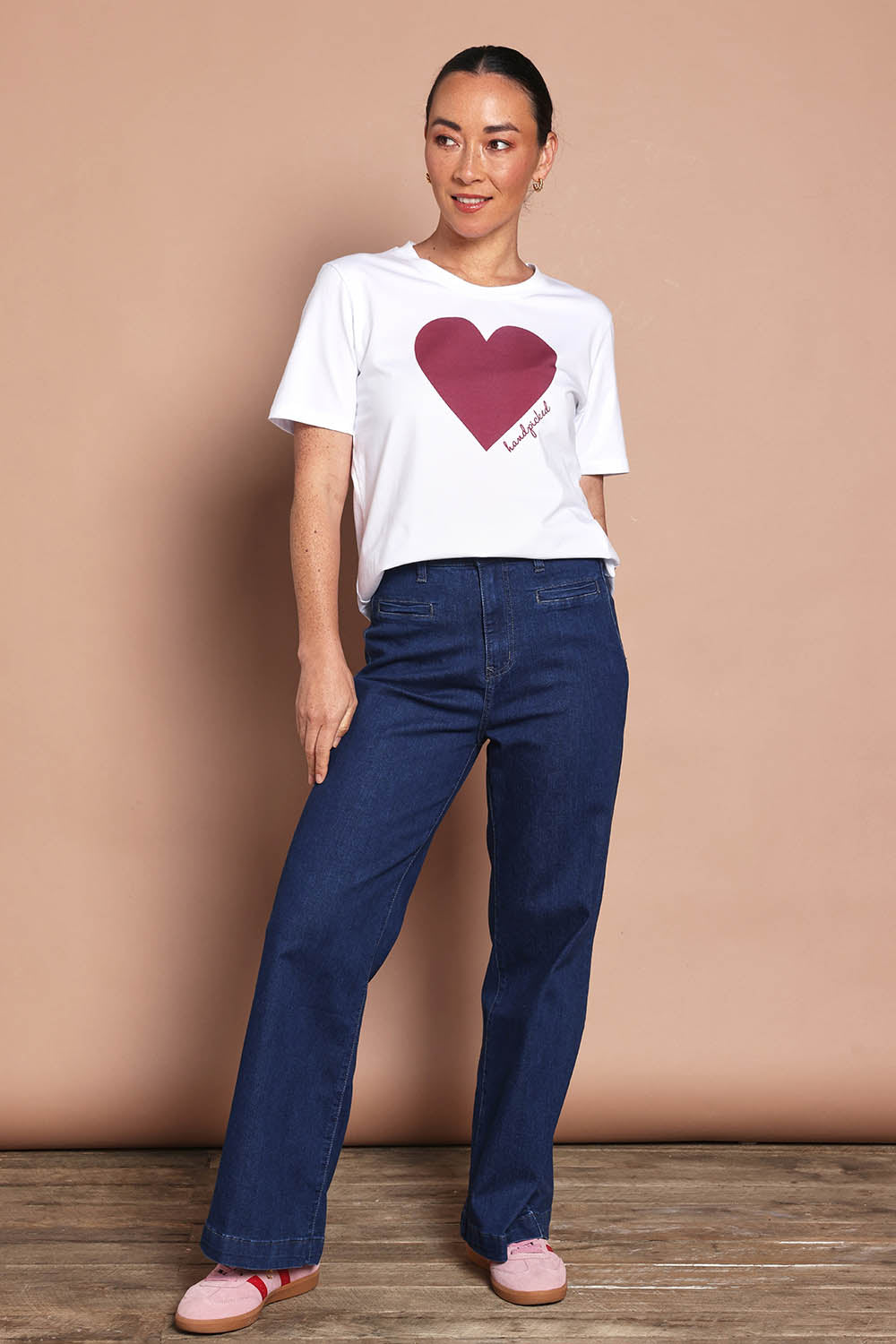 Model Katie wearing size 10 of the Mercerized Cotton Love Tee in colour Burgundy (Red), from the front, showing the whole outfit
