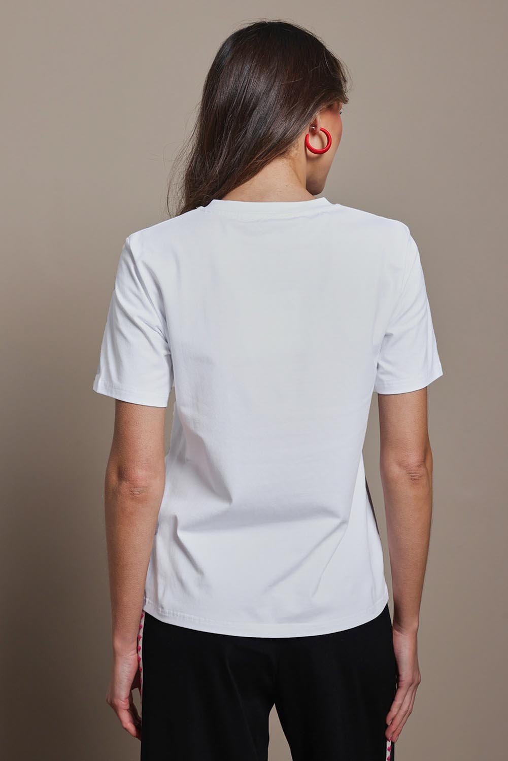 Model Madeline wearing size 10 of the Mercerized Cotton Love Tee in colour Pinkheart (Pink), from the back