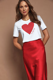 Model Madeline wearing size 10 of the Mercerized Cotton Love Tee in colour White (White), from the front, showing the whole outfit