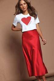 Model Madeline wearing size 10 of the Mercerized Cotton Love Tee in colour White (White), from the front, showing the whole outfit