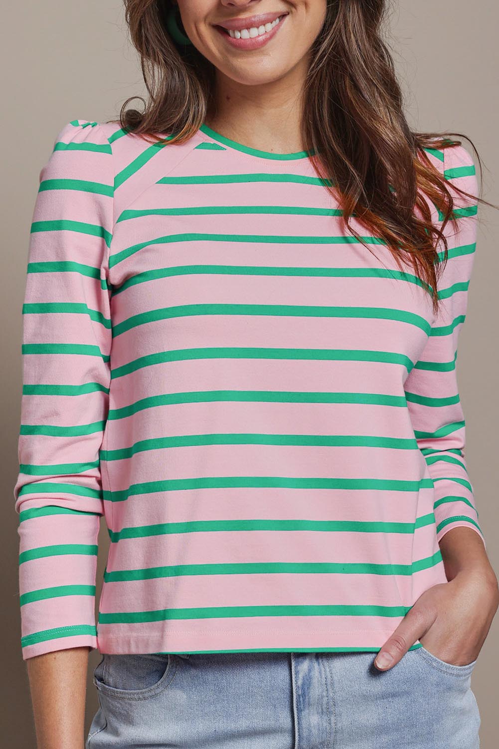 Model Madeline wearing size 10 of the Cotton Stripe Long Sleeve Top in colour Pinkgreen (Green), from the front, cropped image