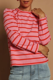 Model Katie wearing size 10 of the Cotton Stripe Long Sleeve Top in colour Redpink (Pink), from the front, cropped image