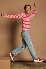 Model Katie wearing size 10 of the Cotton Stripe Long Sleeve Top in colour Redpink (Pink), from the front, showing the whole outfit