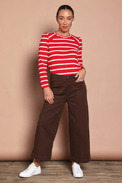 Model Katie wearing size 10 of the Cotton Stripe Long Sleeve Top in colour Redwhite (Red), from the front, showing the whole outfit