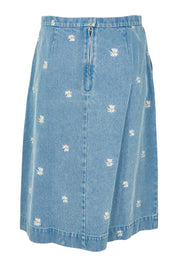 Product shot of the Daisy Denim A Line Skirt in colour Daisy (Blue), from the back
