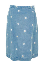 Product shot of the Daisy Denim A Line Skirt in colour Daisy (Blue), from the front