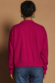 Model Katie wearing size S of the Relaxed Collar Cardigan in colour Fuschia (Pink), from the back