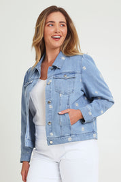 Model Chanel wearing size 16 of the Daisy Denim Jacket in colour Daisy (Blue), from the front, cropped image