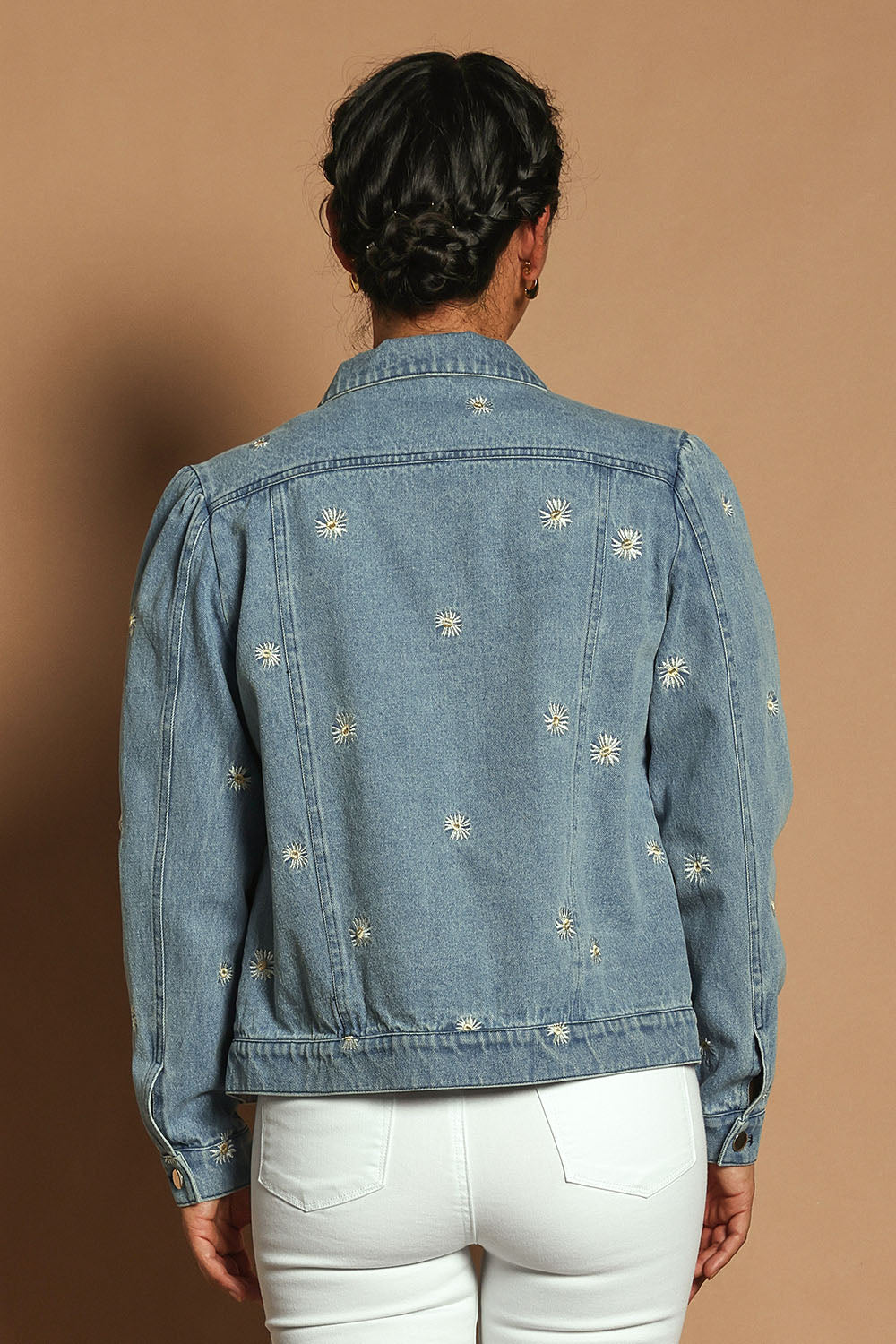 Model Katie wearing size 10 of the Daisy Denim Jacket in colour Daisy (Blue), from the back
