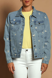 Model Katie wearing size 10 of the Daisy Denim Jacket in colour Daisy (Blue), from the front, cropped image