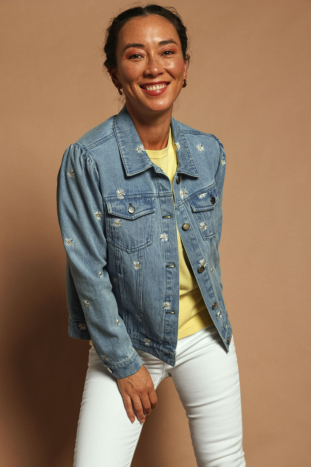 Model Katie wearing size 10 of the Daisy Denim Jacket in colour Daisy (Blue), from the front, showing the whole outfit