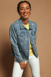 Model Katie wearing size 10 of the Daisy Denim Jacket in colour Daisy (Blue), from the front, showing the whole outfit