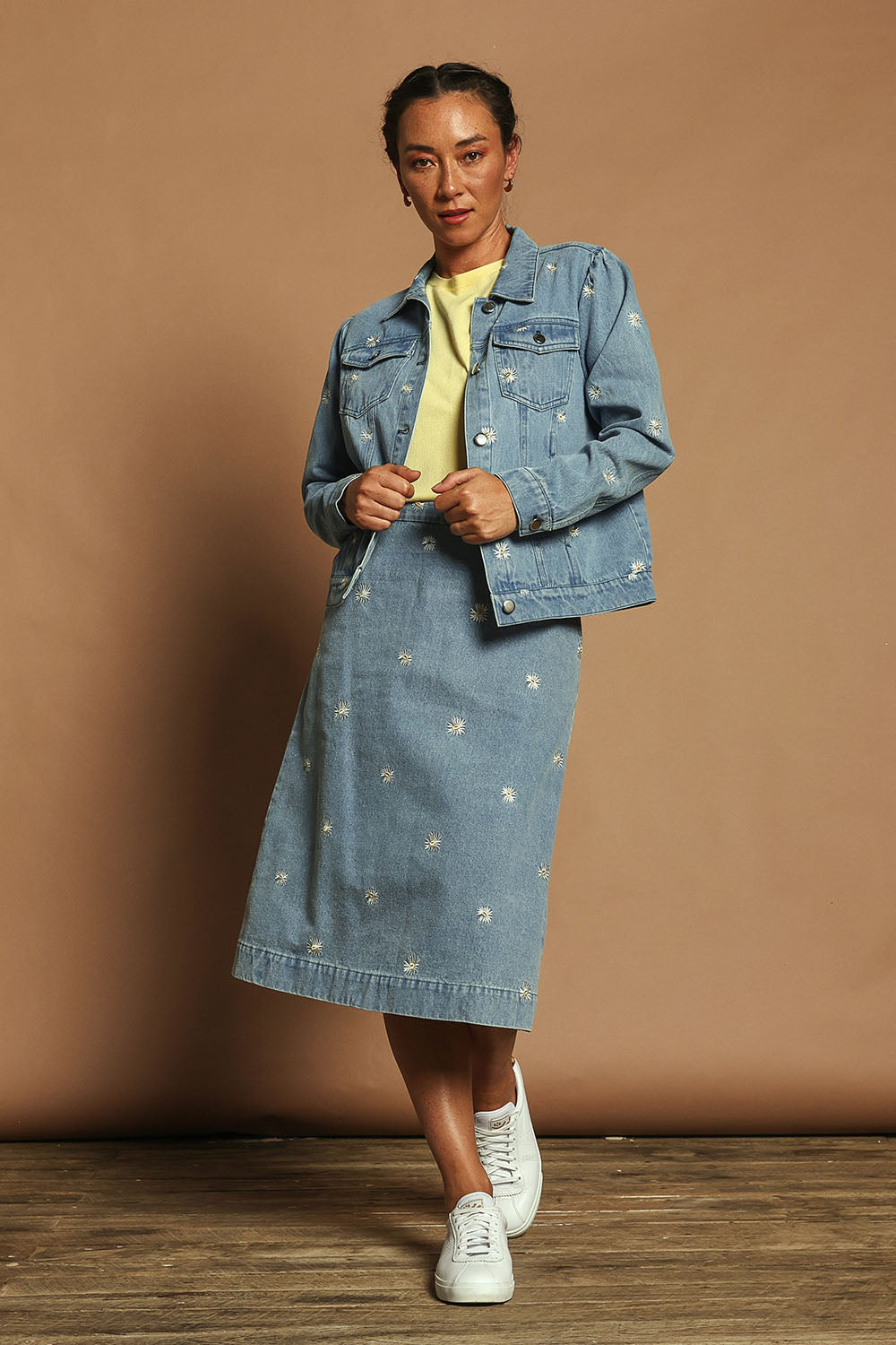 Model Katie wearing size 10 of the Daisy Denim Jacket in colour Daisy (Blue), from the front, showing the whole outfit