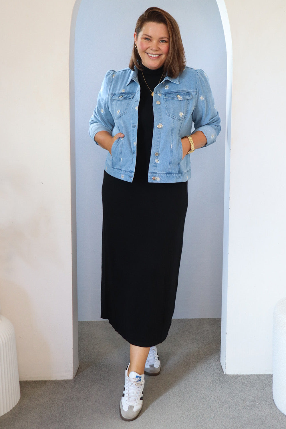 Model Stacey wearing size 14 of the Daisy Denim Jacket in colour Daisy (Blue), from the front, showing the whole outfit