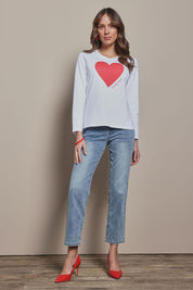 Model Madeline wearing size 10 of the Mercerized Cotton Love Long Sleeve Tee in colour Red (White), from the front, showing the whole outfit