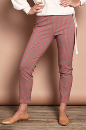 Model Katie wearing size 10 of the Pull On Check Pants in colour Redcheck (Red), from the front, cropped image