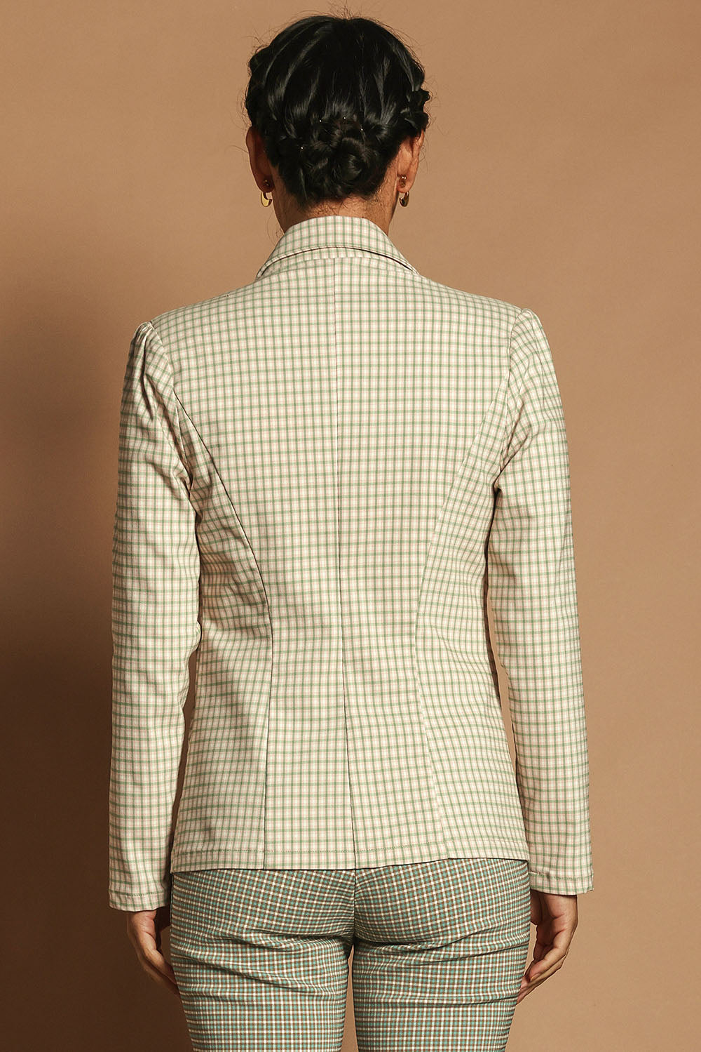 Model Katie wearing size 10 of the Classic Check Blazer in colour Pinkcheck (Pink), from the back