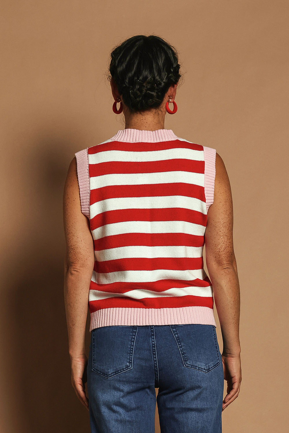 Model Katie wearing size S of the Cotton Blend Stripe Vest in colour Redwhite (Red), from the back