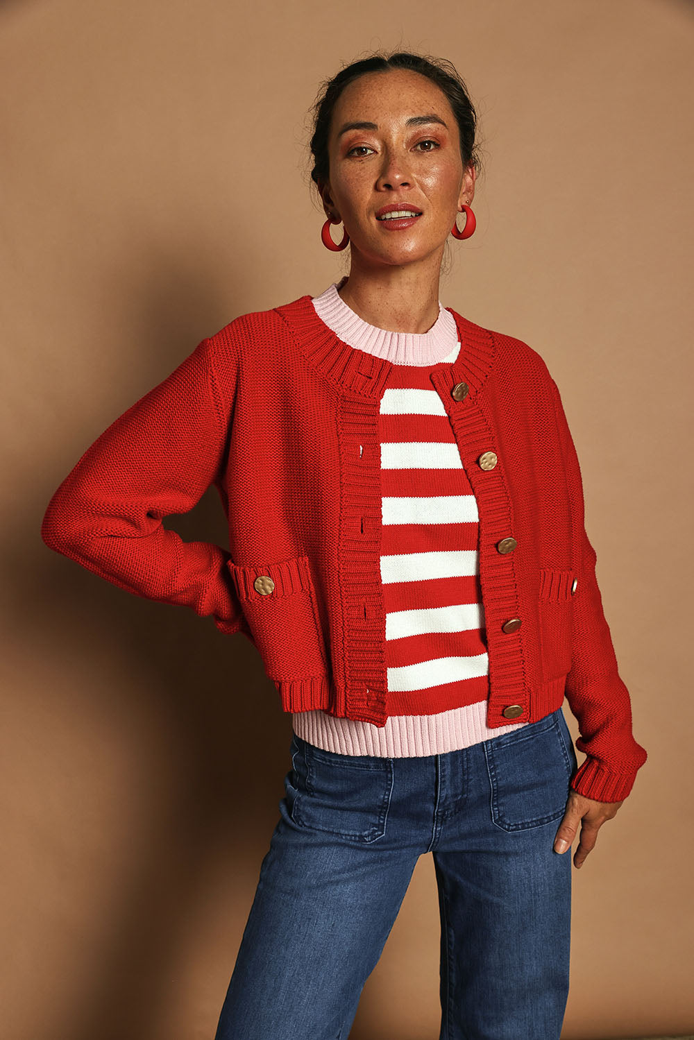 Model Katie wearing size S of the Cotton Blend Stripe Vest in colour Redwhite (Red), from the front, cropped image
