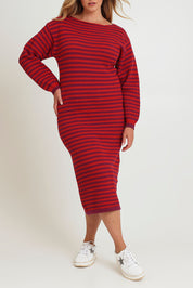 Model Chanel wearing size XL of the Cotton Stripe Knit Dress in colour Redpurple (Red), from the front, cropped image