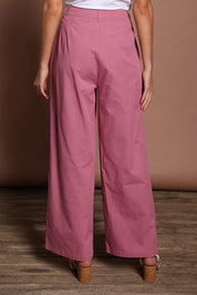 Model Madeline wearing size 10 of the Straight Leg Pant in colour Dustypink (Pink), from the back
