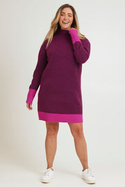 Model Chanel wearing size XL of the Two Tone Knit Dress in colour Wildberry (Pink), from the front, showing the whole outfit
