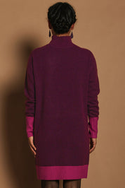 Model Katie wearing size S of the Two Tone Knit Dress in colour Wildberry (Pink), from the back