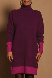 Model Katie wearing size S of the Two Tone Knit Dress in colour Wildberry (Pink), from the front, cropped image