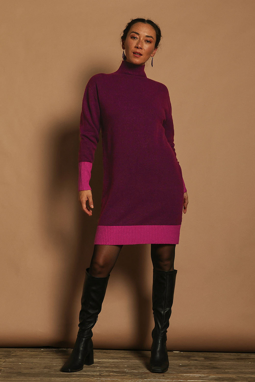 Model Katie wearing size S of the Two Tone Knit Dress in colour Wildberry (Pink), from the front, showing the whole outfit