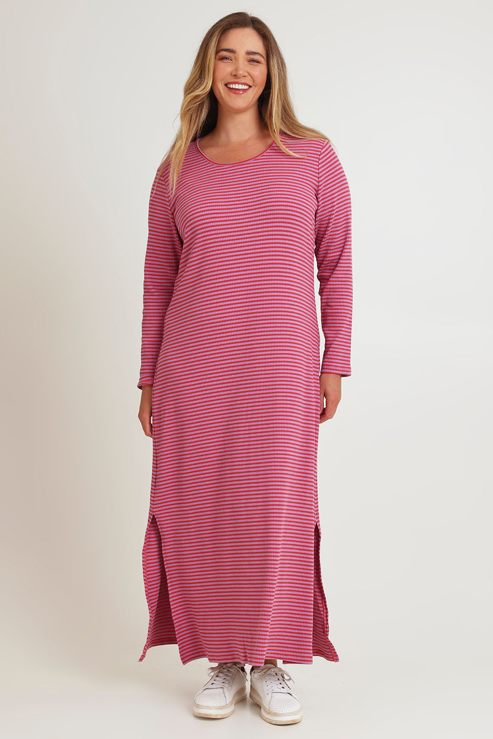 Model Chanel wearing size 16 of the Cotton Long Sleeve Stripe Dress in colour Redlilac (Red), from the front, showing the whole outfit