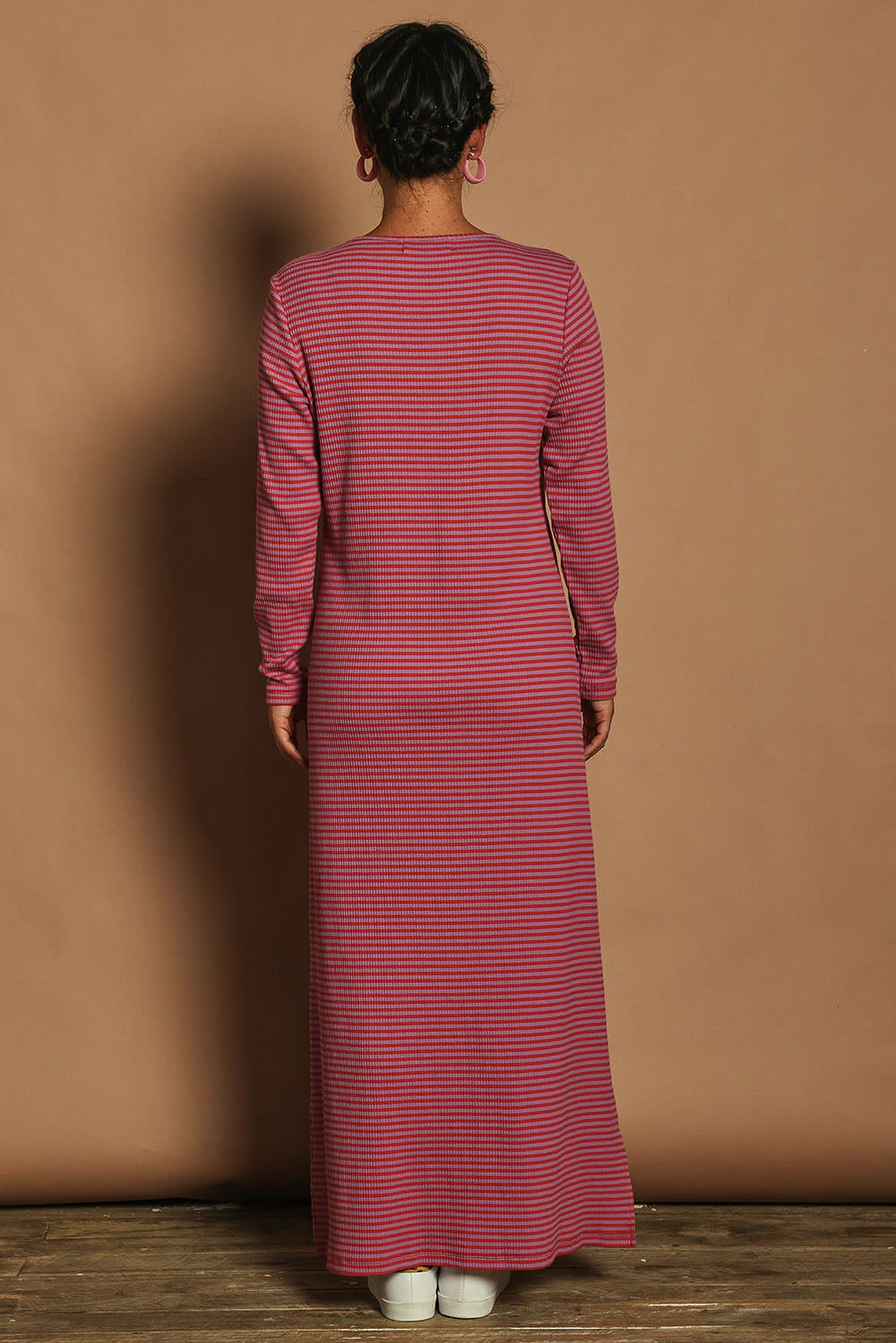 Model Katie wearing size 10 of the Cotton Long Sleeve Stripe Dress in colour Redlilac (Red), from the back