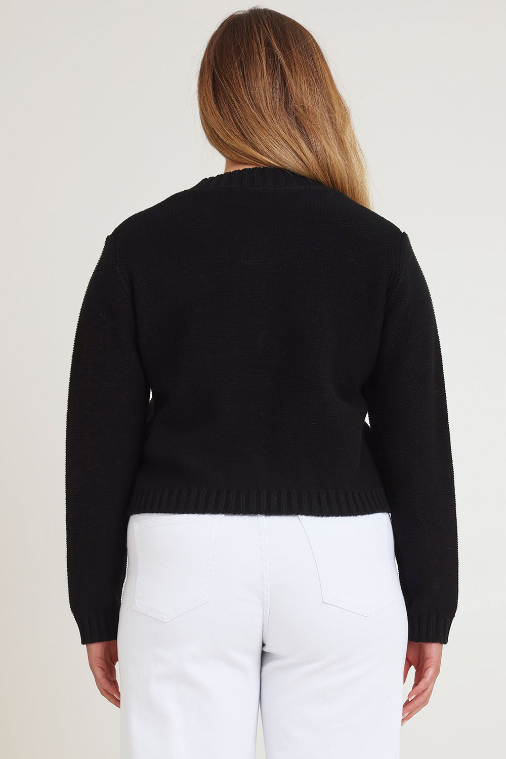 Model Chanel wearing size XL of the Cotton Cardigan in colour Black (Black), from the back