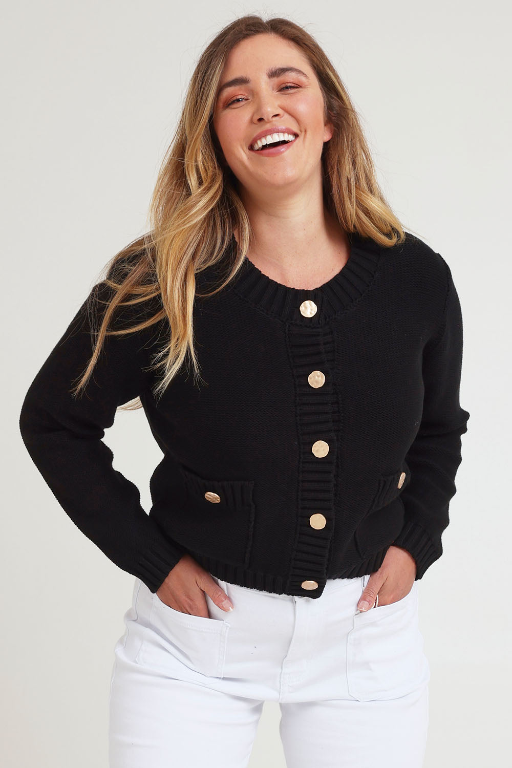 Model Chanel wearing size XL of the Cotton Cardigan in colour Black (Black), from the front, cropped image