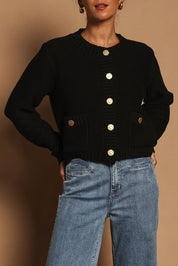 Model Katie wearing size S of the Cotton Cardigan in colour Black (Black), from the front, cropped image