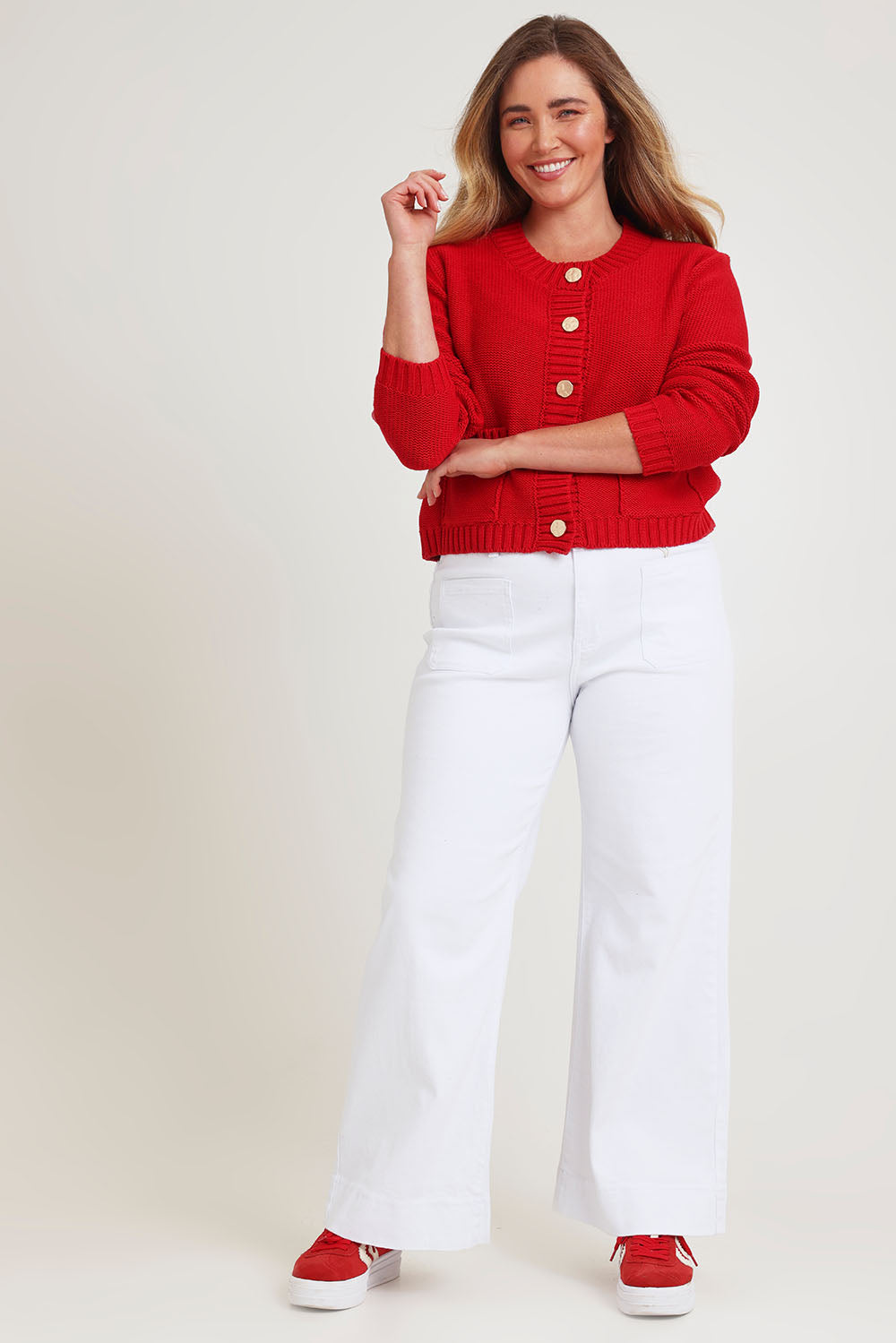 Model Chanel wearing size XL of the Cotton Cardigan in colour Red (Red), from the front, showing the whole outfit