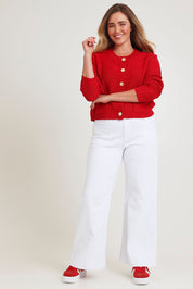 Model Chanel wearing size XL of the Cotton Cardigan in colour Red (Red), from the front, showing the whole outfit