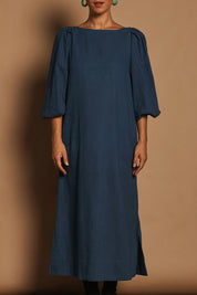 Model Katie wearing size 10 of the Puff Sleeve Midi Cotton Dress in colour Moroccan (Blue), from the front, cropped image