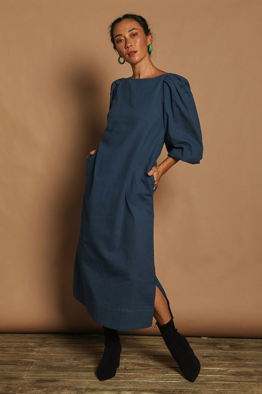 Model Katie wearing size 10 of the Puff Sleeve Midi Cotton Dress in colour Moroccan (Blue), from the front, showing the whole outfit