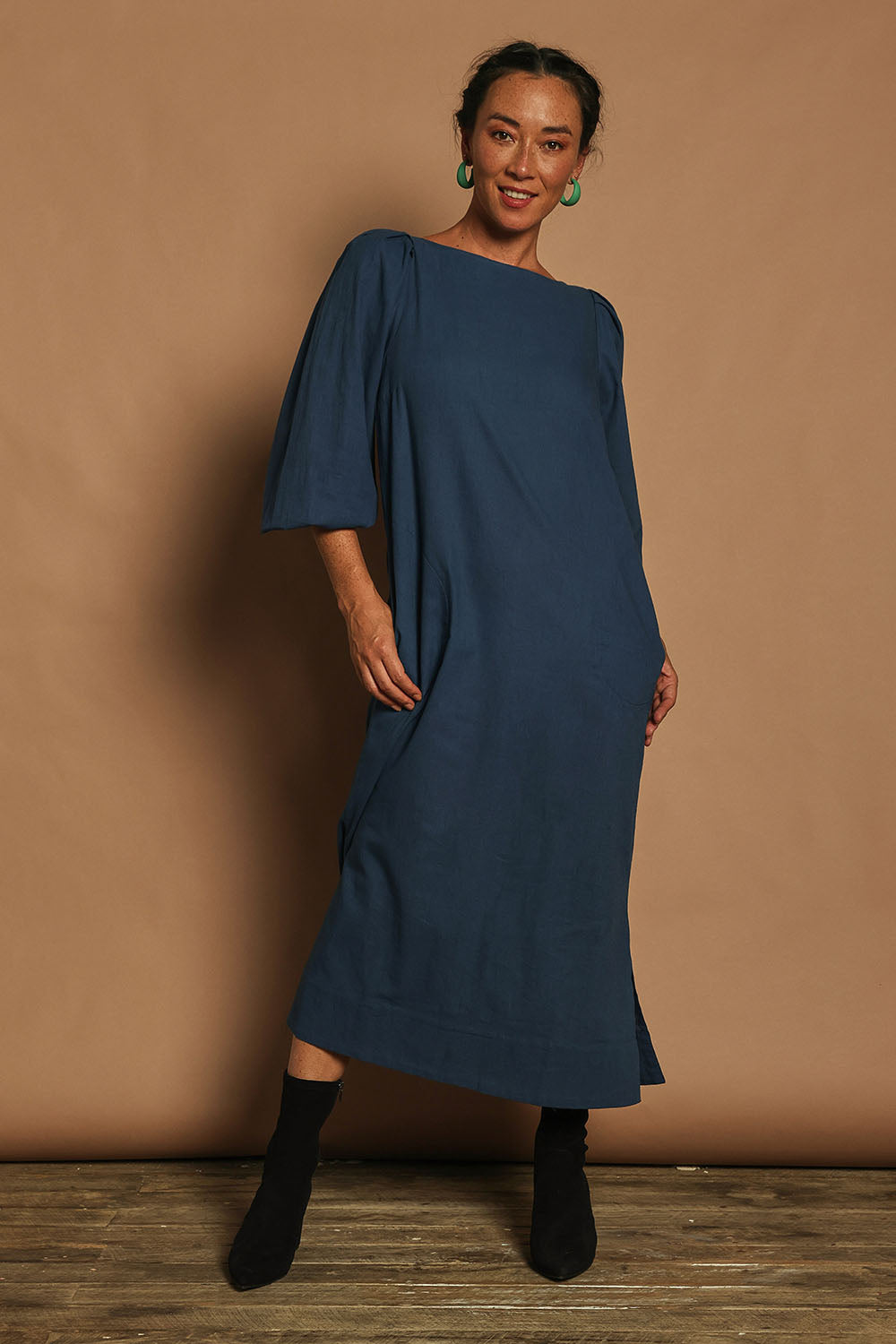 Model Katie wearing size 10 of the Puff Sleeve Midi Cotton Dress in colour Moroccan (Blue), from the front, showing the whole outfit