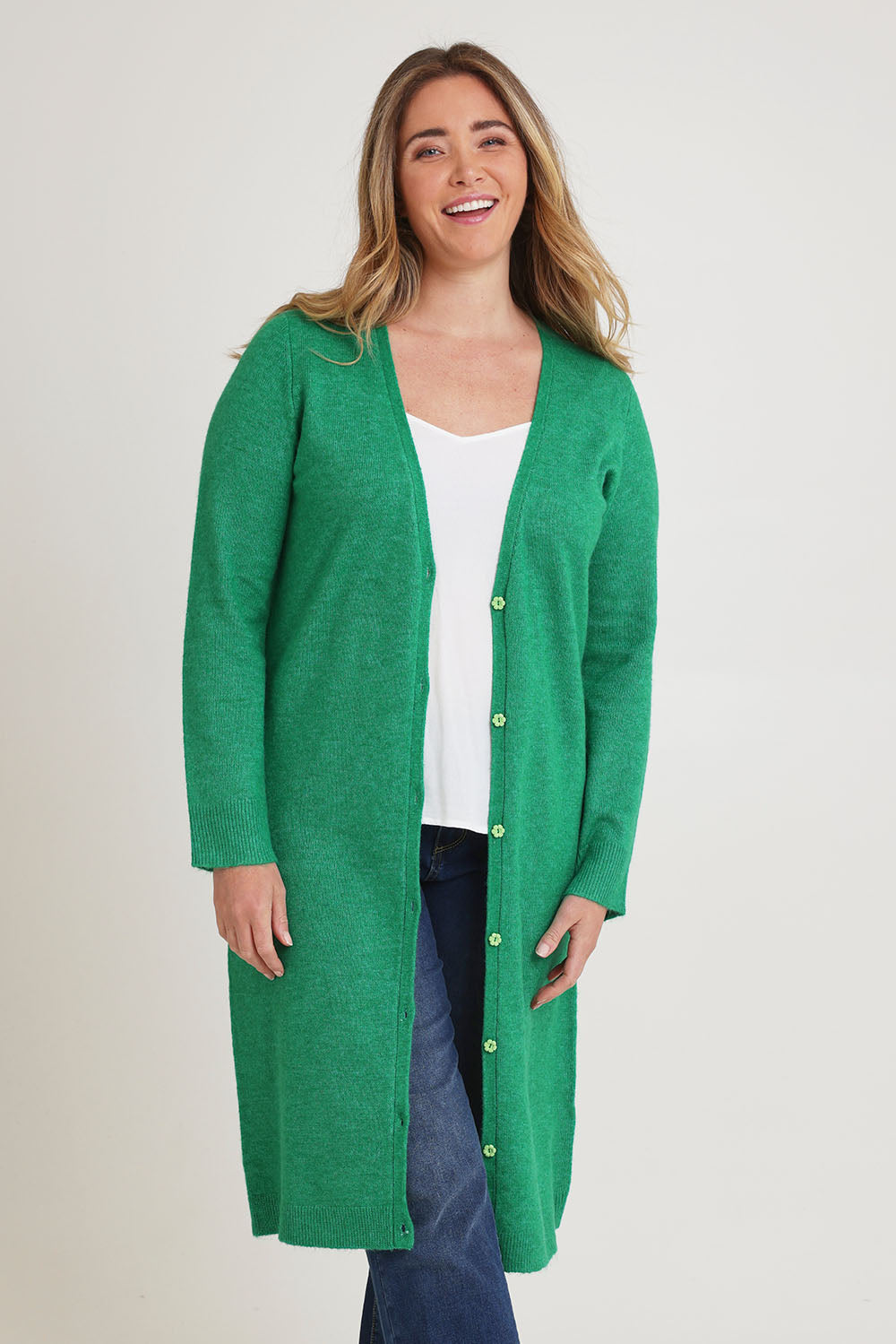 Model Chanel wearing size XL of the Long Textured Cardigan in colour Boldgreen (Green), from the front, cropped image