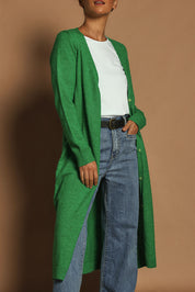 Model Katie wearing size S of the Long Textured Cardigan in colour Boldgreen (Green), from the front, cropped image
