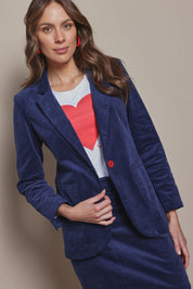 Model Madeline wearing size 10 of the Corduroy Blazer in colour Dustyblue (Blue), from the front, cropped image