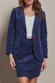 Model Madeline wearing size 10 of the Corduroy Blazer in colour Dustyblue (Blue), from the front, cropped image